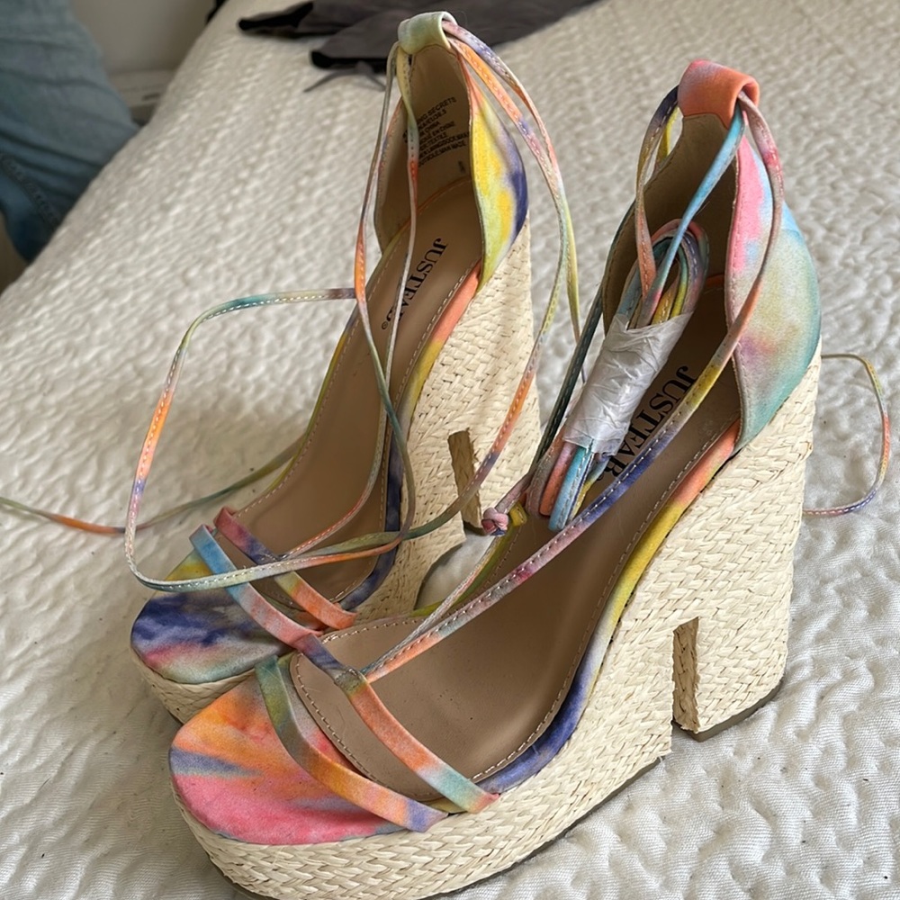 Woman’s lifted sandals